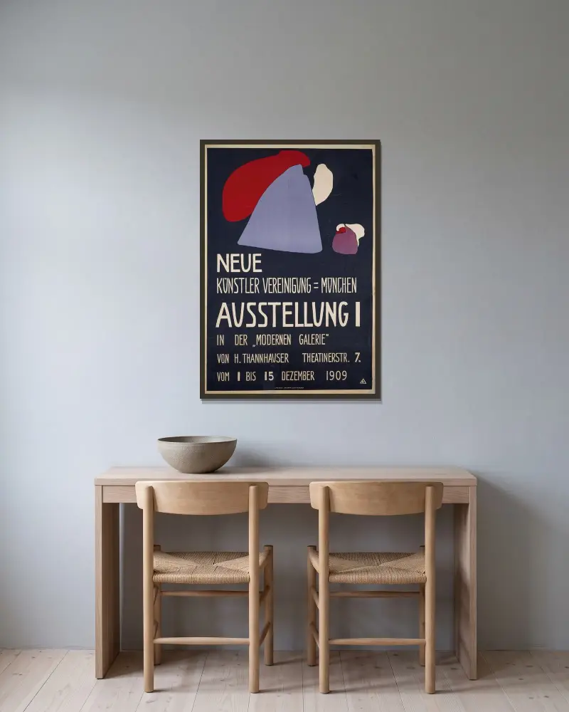 Plakat für die erste Ausstellung der Neuen Künstlervereinigung München von Wassily Kandinsky gerahmt an einer Wand
