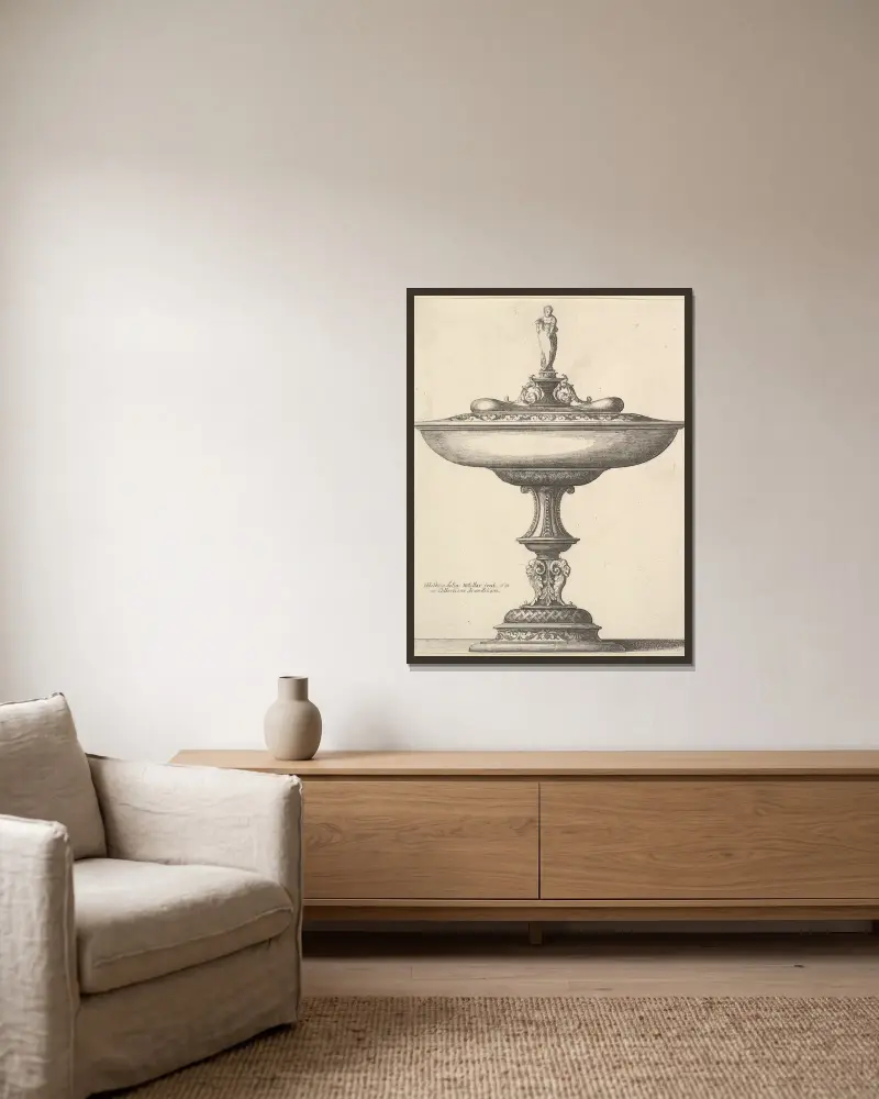 En vid kopp med ornerad fot av Wenceslaus Hollar inramad på en vägg