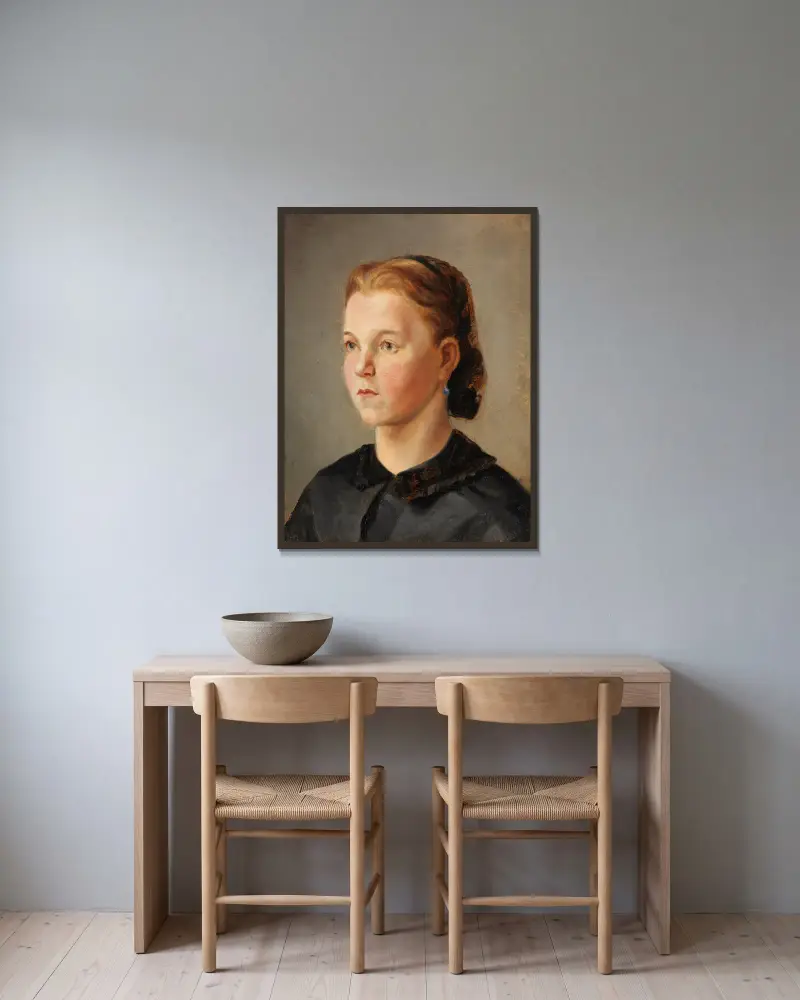 Mädchenbildnis (Therese Heyden) av Wilhelm Leibl inramad på en vägg