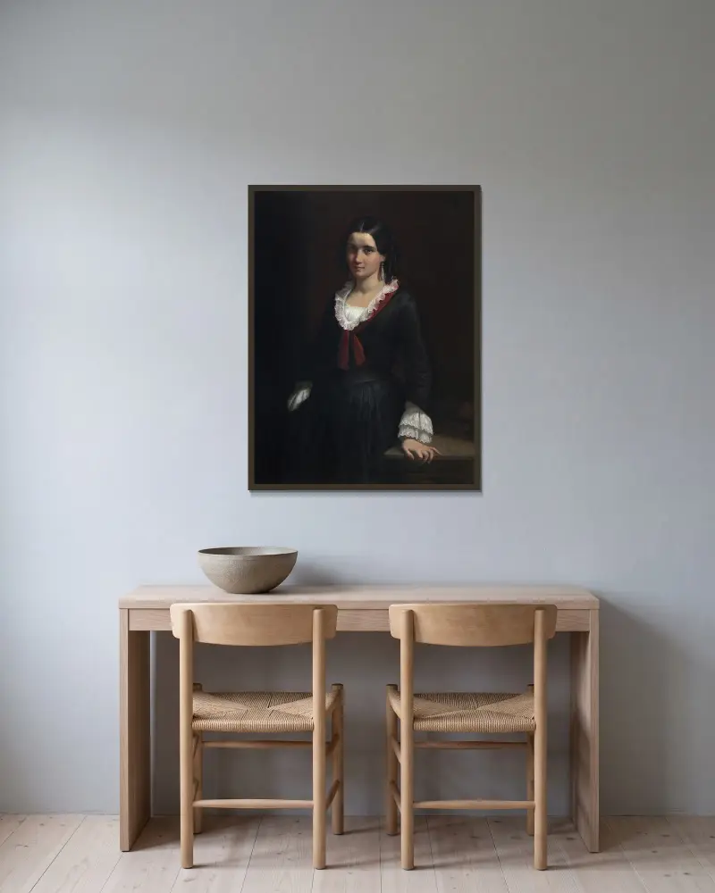 Porträtt av fröken Vilhelmine (Ville) Hage, senare fru Heise (1838–1912) av Wilhelm Marstrand inramad på en vägg