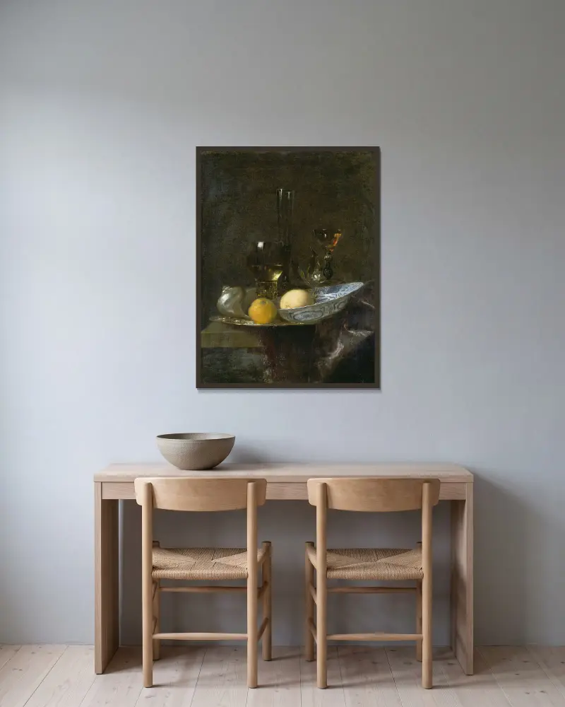 Stillleben mit Orangen von Willem Kalf gerahmt an einer Wand