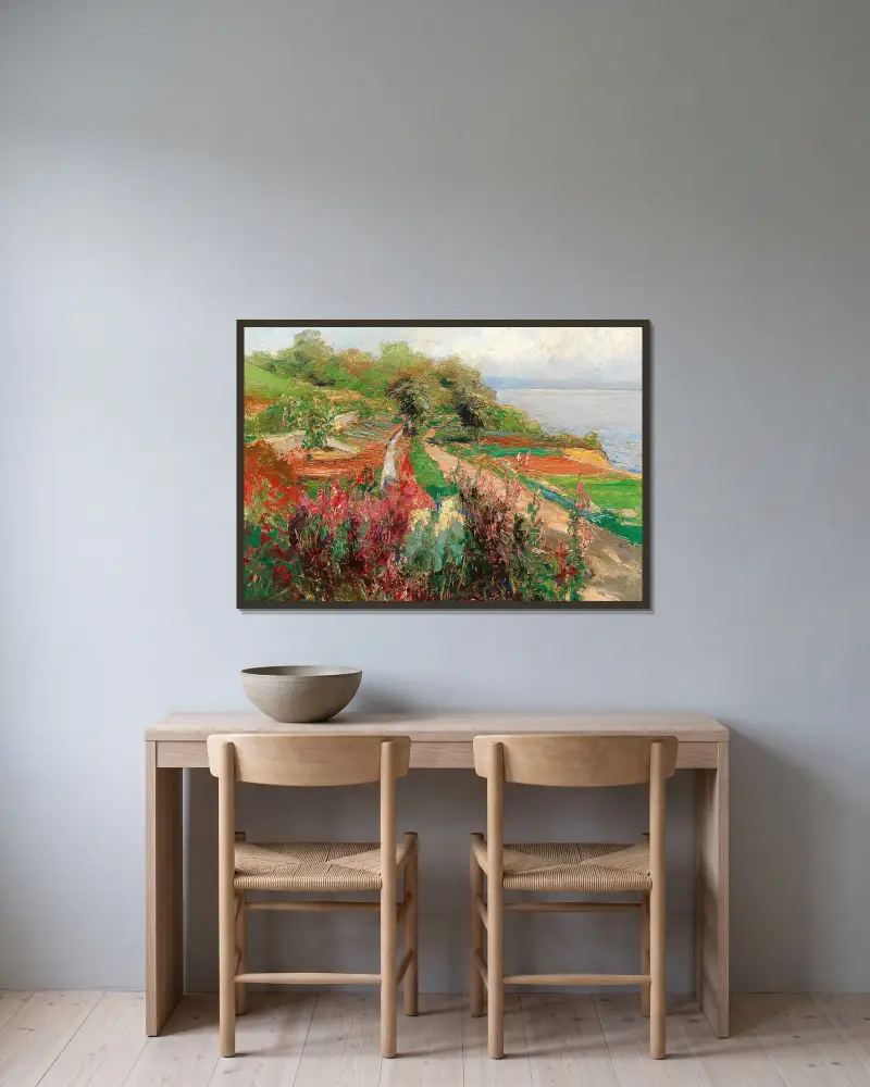 A coastal landscape av Olga Wisinger-Florian inramad på en vägg