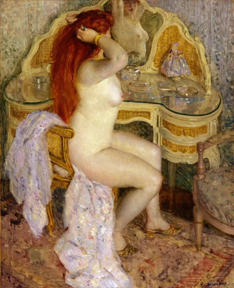 Sittande naken kvinna vid sitt toalettbord av Frederick Carl Frieseke