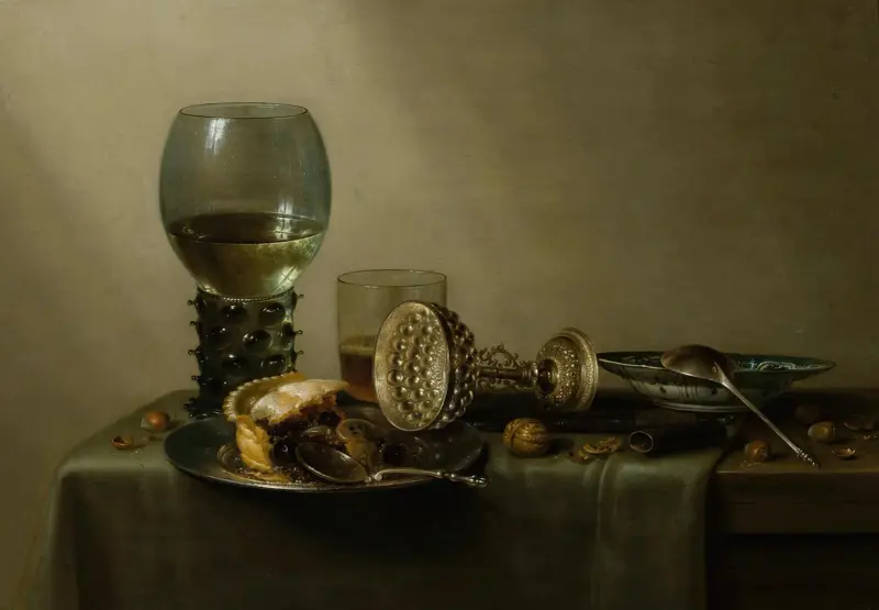 Dessert, stilleben med tårta, vin, öl och nötter av Willem Claesz Heda
