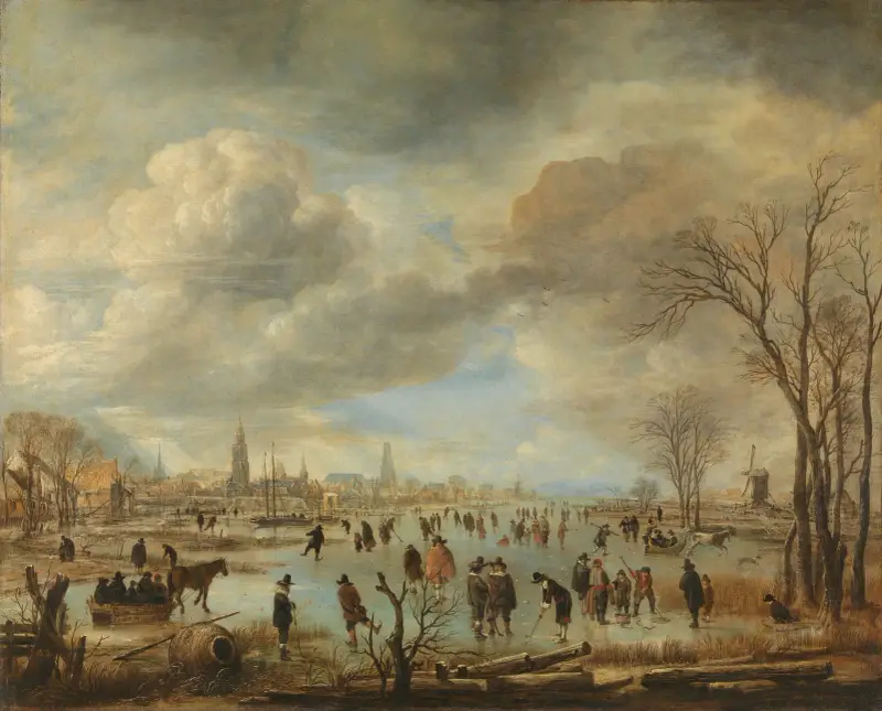 Vinterlandskap nära en stad med kolfspelare och hästslädar av Aert van der Neer