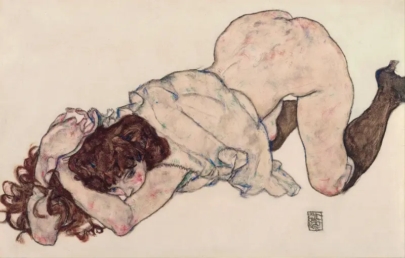 Knästående flicka, vilande på båda armbågarna av Egon Schiele