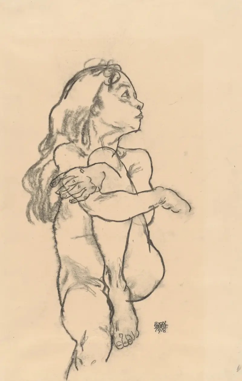 Sittande naken flicka som greppar sitt vänstra knä av Egon Schiele