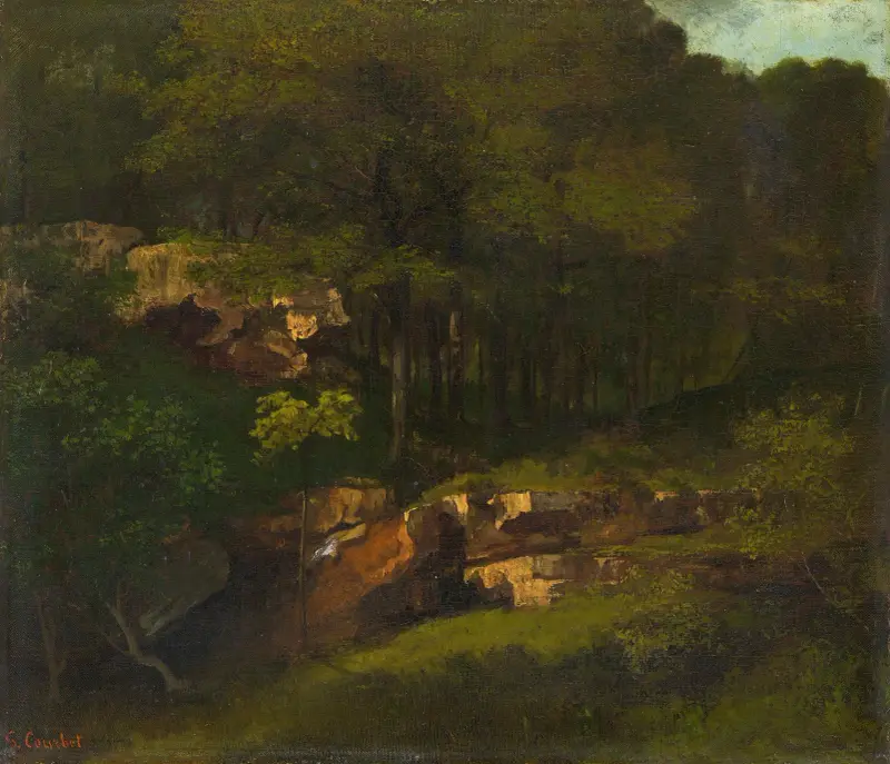 Skogsbeklädd bergssluttning med klippor av Gustave Courbet