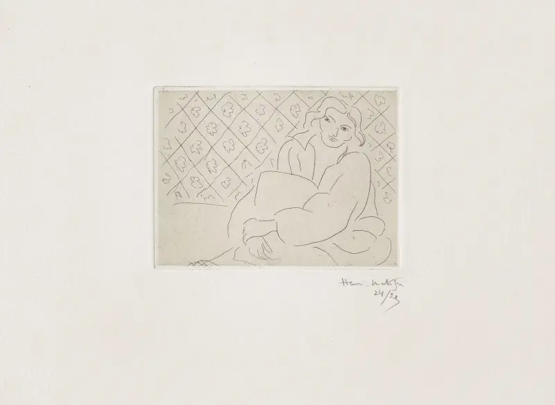 Sittande figur mot blommigt kakel av Henri Matisse