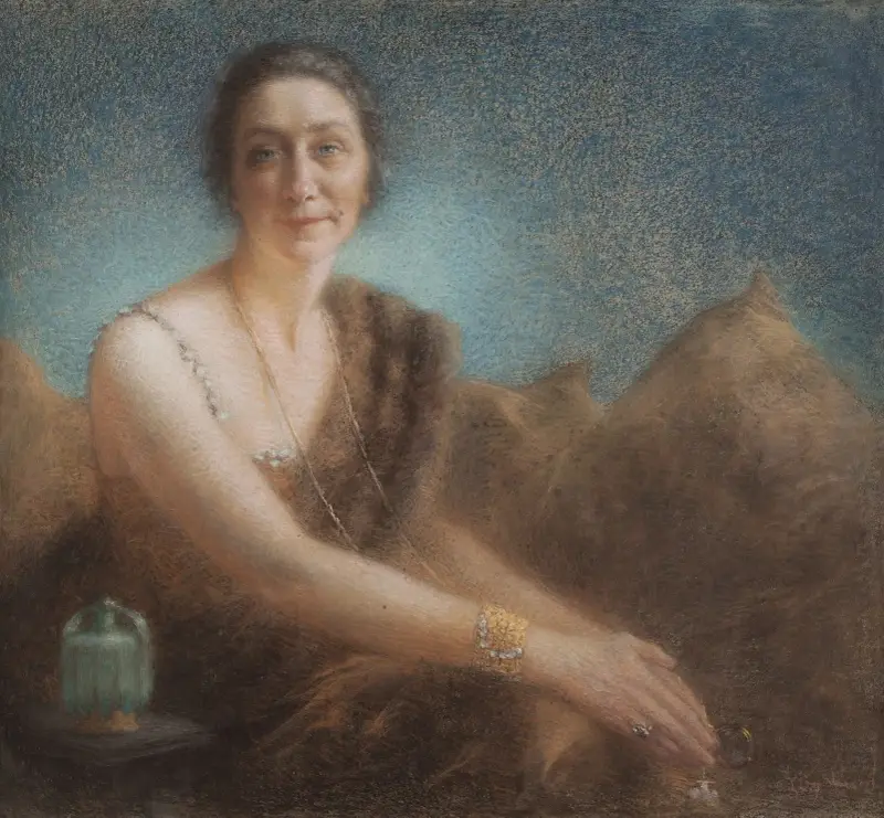 Elegant kvinna på en soffa av Lucien Lévy-Dhurmer
