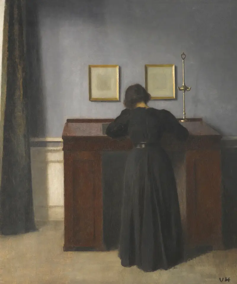 Ida am Schreibtisch stehend von Vilhelm Hammershøi